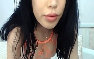 Asian Seductress Unveils Her Full Round Boobies