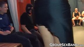 Gangbanged hottie pounded while sucking dick