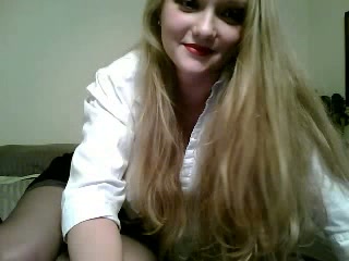 Slutty blonde chick in sexy stockings masturbating on webcam