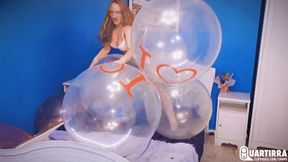 Q761 Mariette in sexy white lingerie rides and pops big clear balloons - 480p