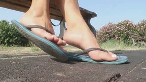 Playing with her flip-flops. MOV