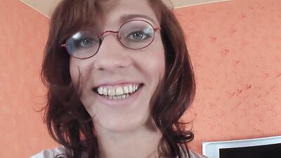 Nerdy MILF Sidney Love is filmed while drilling cunt with a dildo