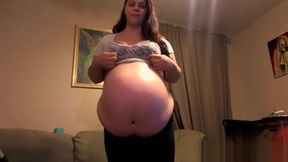 Massive Pregnant Woman in Tight Clothes