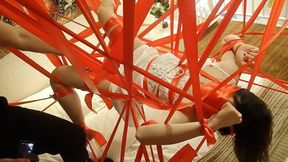 BC03-The girl was caught by Spider-Man, suspended in a silken web, experiencing a vibrating climax.