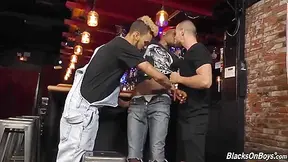 Dark Guys Sharing The Bartender At A Pub