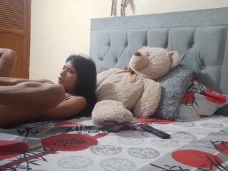 Brunette masturbates with a giant dildo.