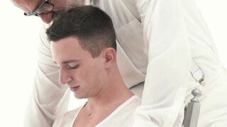 Suited DILF is playing with the girthy cock of a teen