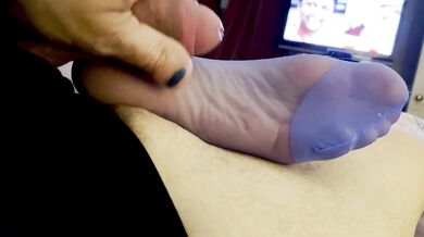 He Squirts a Big Load While Ignoring My Blue Pantyhose Footjob