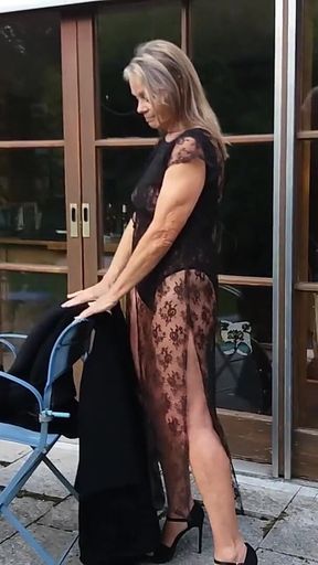 A Mature Woman Shows off Her Figure Outside in a Lace Bodysuit!