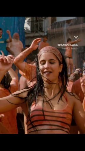 Indian woman in red bikini dancing