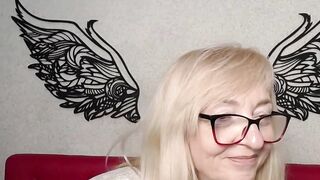 Blonde MILF with glasses on webcam