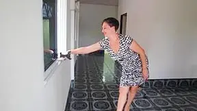 Nice Woman Shows Her Body When Undressing From White-black Dress