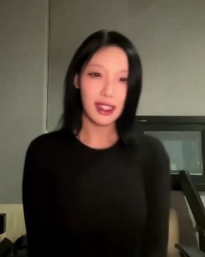 K-pop star in a black dress