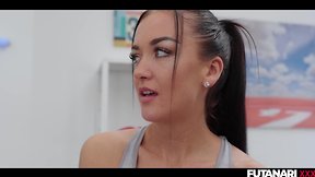 Futa brunette erupts with orgasmic release in gym