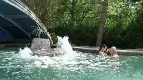 Enamored lesbian couple make out and eat each other's pussies by the pool