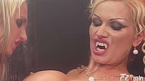 Sexy waitress gets her pussy fisted and licked by horny vampire MILF