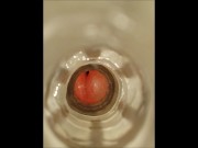 Extreme close-up of the inside of a fleshlight whilst I fuck it and cum inside it.