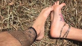 feet on the grass