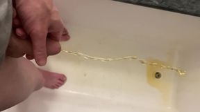 Amateur Boy Pissing, with Close-up and Good Quality Slow Motion of the Load of Pee Coming Out of the Pee-hole (urethra)