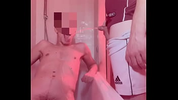 Amateur boy lost a bet, gets naked in the bathtub and is pissed on by his flatmate (body and mouth)