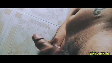 Alien boy jerking his big uncut cock in the shower and eating his own cum