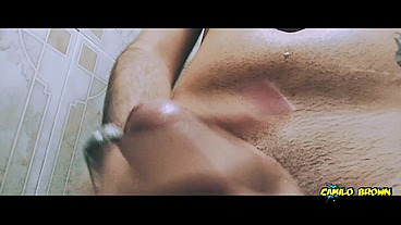Alien boy jerking his big uncut cock in the shower and eating his own cum