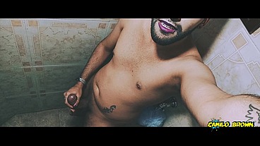 Alien boy jerking his big uncut cock in the shower and eating his own cum