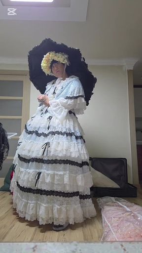 a cross-dresser dancing in a dress