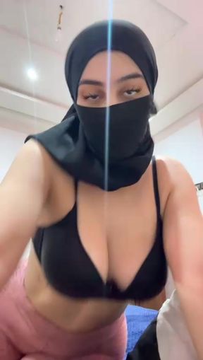 Hijab stays on while this arab whore plays with her tits