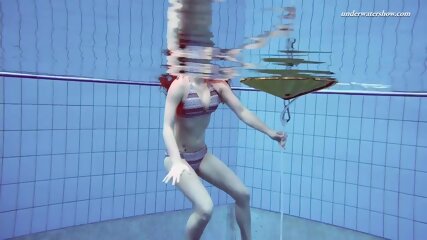 Tattooed babe Liza Bubarek showing her naked ass underwater
