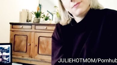 stepmother surprises her stepson and sucks his cock in front of a porn movie