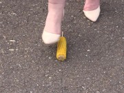 Crush-fetish. Thick legs in heels crushed the corn mercilessly.