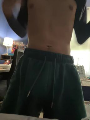 Shirtless man in blue sweatpants