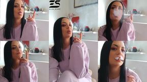 Comfy smoking in a pink sporty outfit