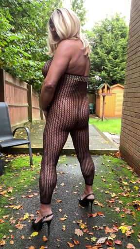 Crossdresser Kellycd2022 in Black Sexy Fishnet Play Suit and Heels