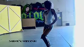 Curly haired ebony cutie loves to ride on a huge cock