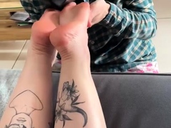 Brunette with foot fetish rubs big dick with her feet in POV