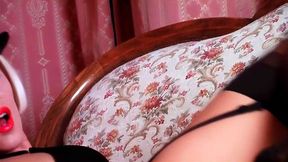 Gangster slut teases with seductive legs in vintage nylon black stockings