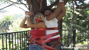 Adventurous Couple Gwen Stanley And Rio Are Wrapped To A Tree With Caution Tape!