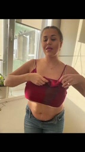 milf is doused with warm milk that sticks on her big tits