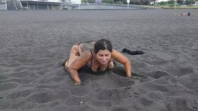 curvy mommy is playing with her boobs on the beach!