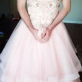 Wearing and enjoying a gorgeous pink quinceanera gown