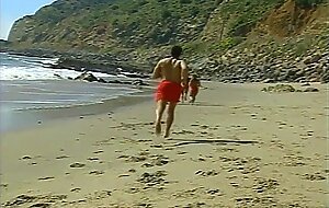 A brunette lifeguard pleases her pussy while working