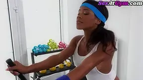 Busty black gym les riding dildo after workout