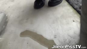 Teenage Asian redhead filmed while peeing on the street