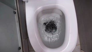 Destroying my jeans, peeing on and flushing them in the toilet