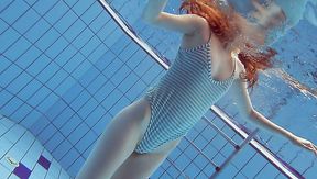 Slim beauty Libuse swimming naked in a pool in arousing sex video