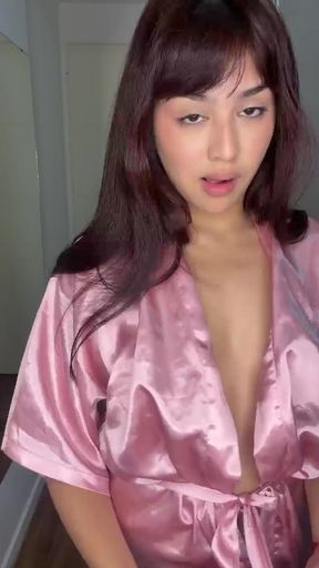 Adorable teen showcases her tits and pussy
