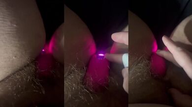 Pink thrusting toy stuffed into bushy tight pussy