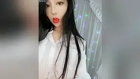 Beautiful Asian Darling Playing On Camera